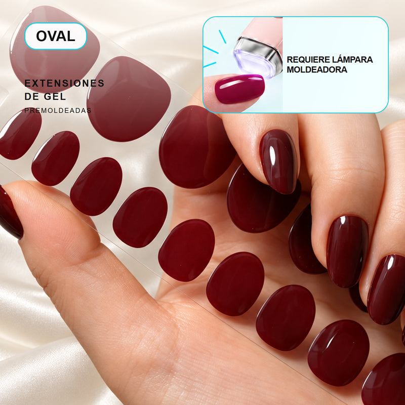 Extensiones de gel NOOVES Cherry Noir, forma oval, mano y tira sobre satén