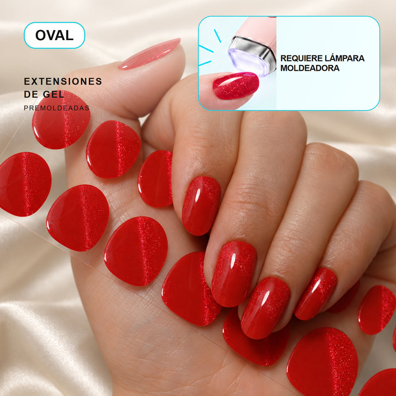 Extensiones de gel NOOVES Spicy Ruby, forma oval, mano y tira sobre satén