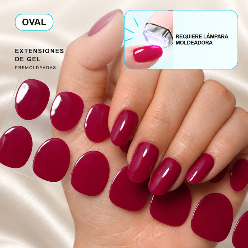 Extensiones de gel NOOVES Fuchsia Night, forma oval, mano y tira sobre satén