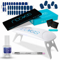 Kit de láminas Deep Navy y Cat Navy con lámpara UV/LED estándar, top coat y Quartz Dual Stick sobre fondo blanco.