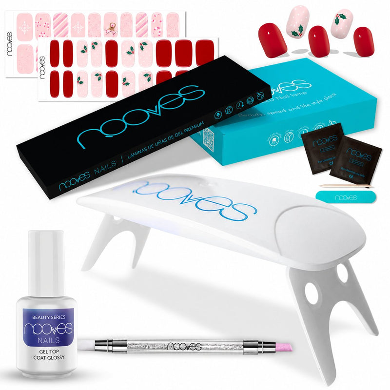 Kit de láminas Christmas Kiss y Silent Snow con lámpara UV/LED estándar, top coat y Quartz Dual Stick sobre fondo blanco.