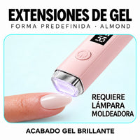 Extensión de forma almond sobre una uña junto a una lámpara rosa con luz violeta.