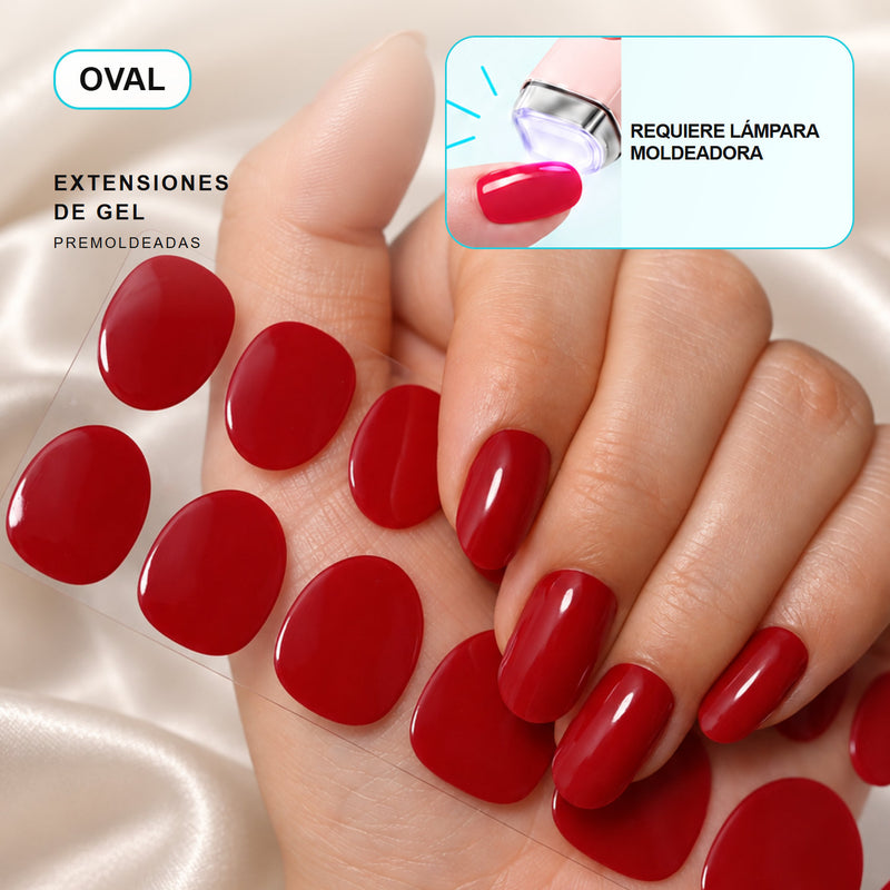 Extensiones de gel NOOVES Crimson Love, forma oval, mano y tira sobre satén