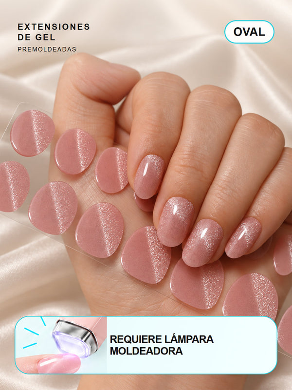 Extensiones de gel NOOVES Fairy Dust, forma oval, mano y tira sobre satén en tarjeta